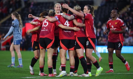 Manchester United players celebrate after Maya Le Tissier (No 4) scores their second goal against Sunderland.