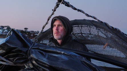 Samuel McLennan on rubbish boat