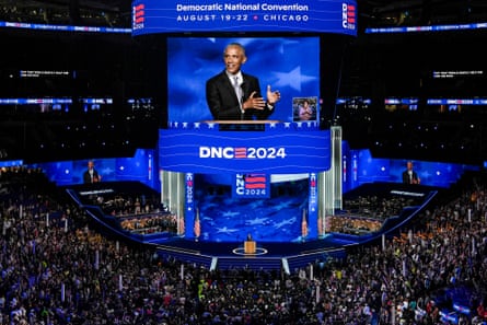 a man speaks to an arena full of people