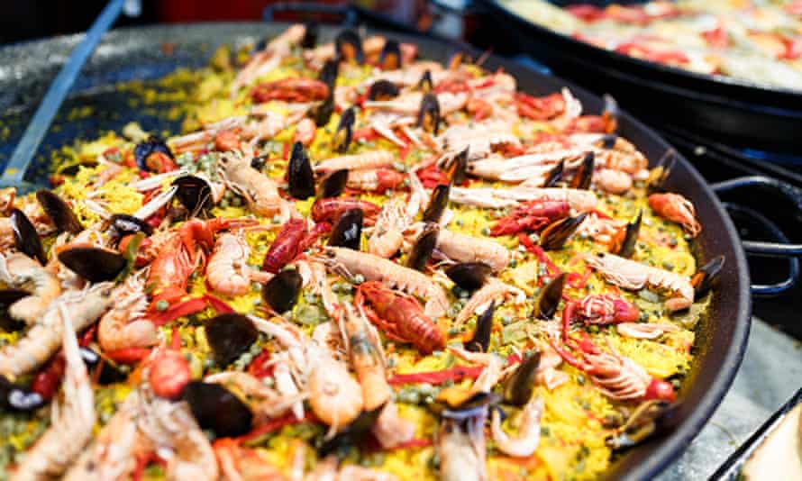 paella, yellow rice, mussels and seafood