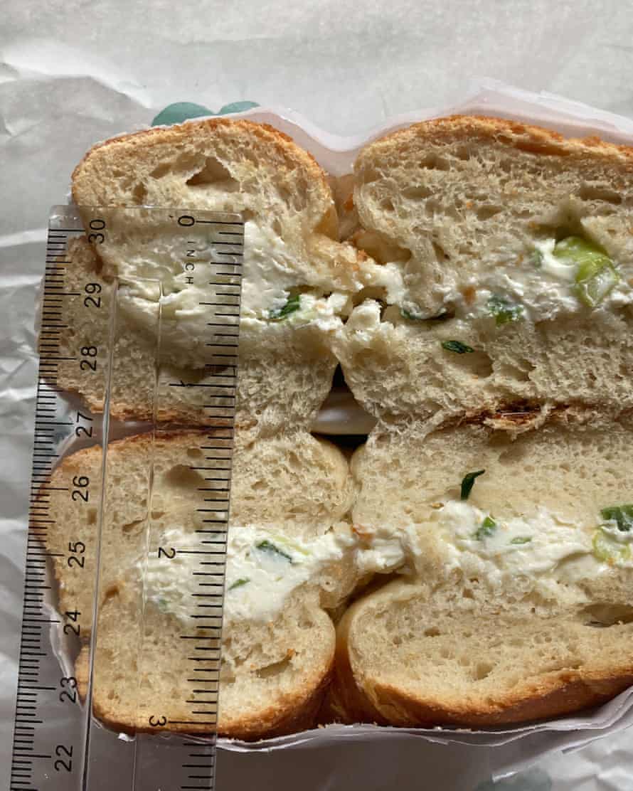 An Ess-a-Bagel bagel with 3/4 of an inch of cream cheese.