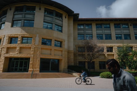 Students bike to class on a recent afternoon at the Stanford University campus, where so many tech workers have started their careers.