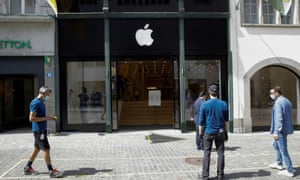 Coronavirus live news: Hong Kong bars, gyms and cinemas reopen; 20m Americans lost jobs in April 14 Men wear protective masks as they check distance markers in front of an Apple store, in Zurich, Switzerland May 8, 2020.