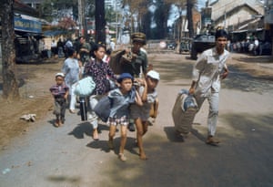 A family flees the fighting in the Cholon area of Saigon during the 1968 Mini-Tet offensive