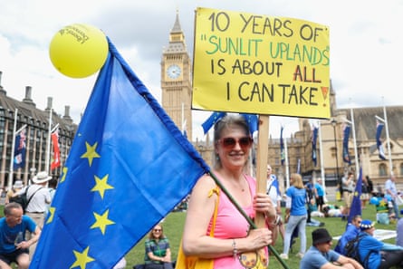 Demonstrators take part in a march calling for the UK to rejoin the EU on the 10th anniversary of the referendum in London.
