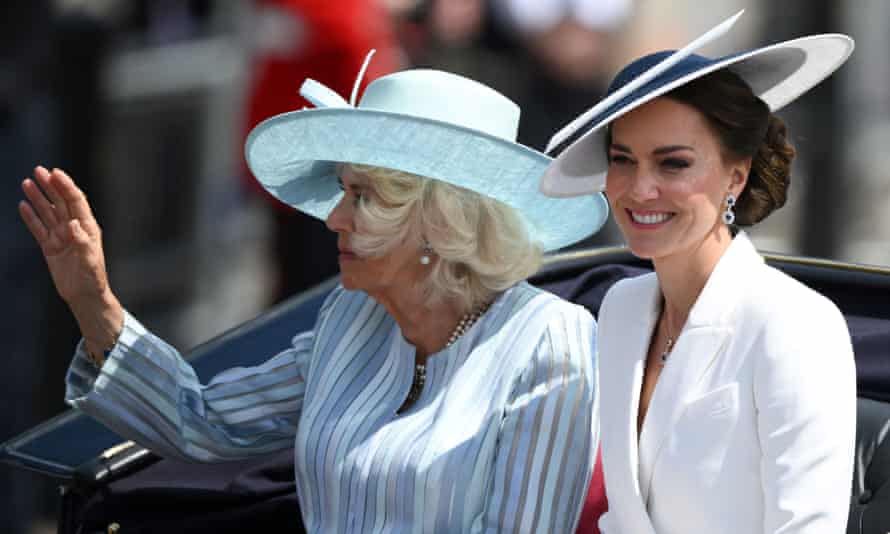 Camilla, Duchess of Cornwall, and the Duchess of Cambridge travel in a horse-drawn carriage.