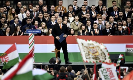 Orbán addressing supporters at a so-called ‘peace march’ in Budapest.