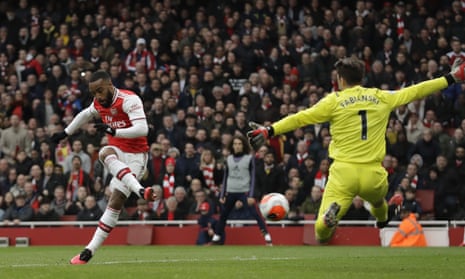 Arsenal’s Alexandre Lacazette finishes past West Ham’s Lukasz Fabianski after VAR ruled Mesut Özil had been incorrectly ruled offside in the buildup. 