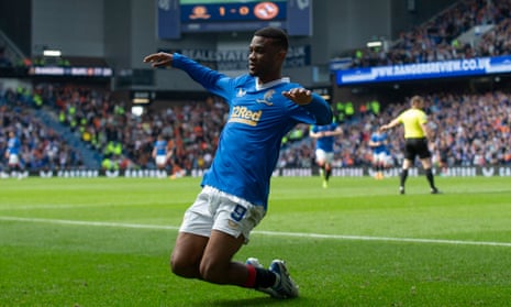 Amad Diallo celebrates the second, clinching goal at Ibrox.