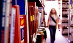 Student walking in library