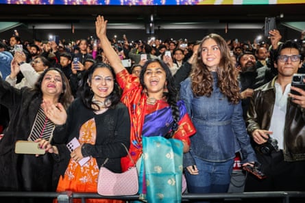 People cheer inside Marvel Stadium in Melbourne at an event honouring the Indian prime minister, Narendra Modi.