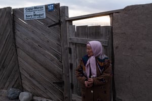 BuunTereshkovakova, 58, stands in front of the ethnic museum in Sary-Mogol