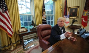 US President Trump speaks during an interview in the Oval Office at the White House in Washington.