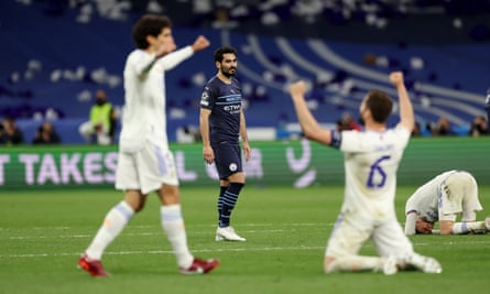 Real Madrid players celebrate after their remarkable comeback knocked out Manchester City in the 2022 semi-final.