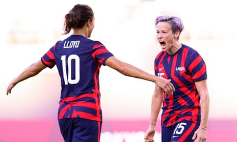 Megan Rapinoe celebrates with Carli Lloyd after scoring one of her two goals for USA against Australia.