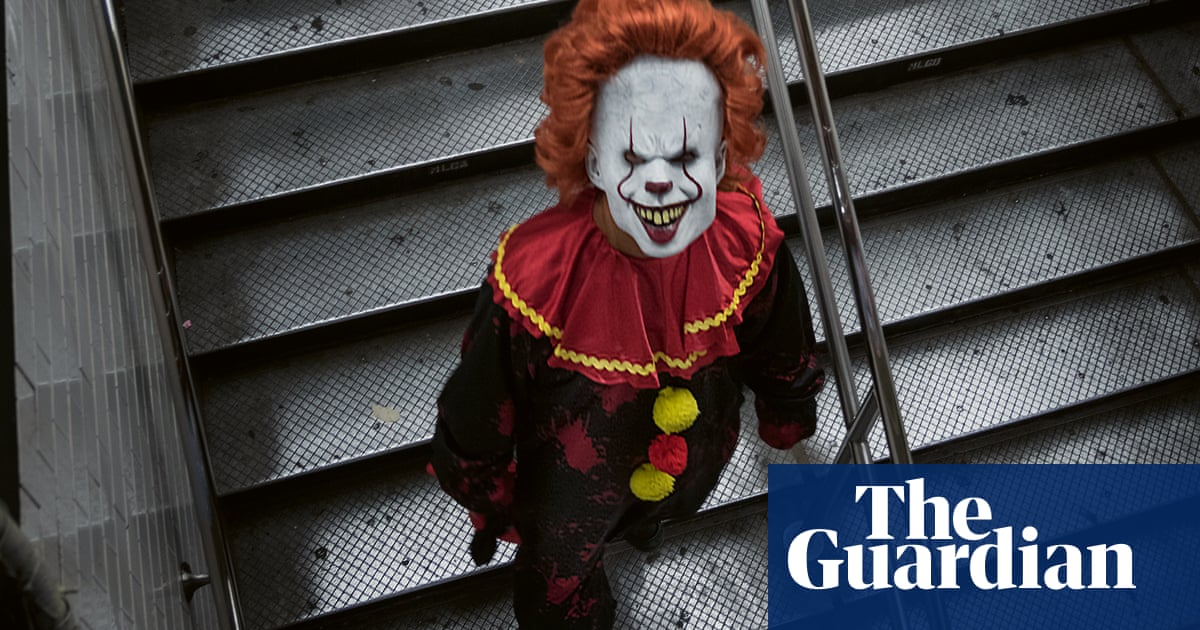 What lurks beneath: demons and dead brides ride New York’s subway – in pictures