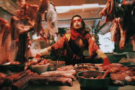 The local market pork seller, played by Yolanda Mesula.