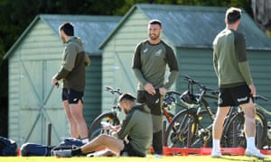 Quade Cooper (centre) smiles during the Wallabies training session at Sanctuary Cove on the Gold Coast on Monday. Cooper will travel with the team to New Zealand ahead of the first Bledisloe Cup Test on August 7.
