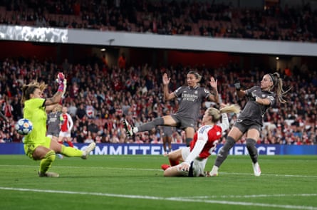 Alessia Russo scored twice as Arsenal beat Real Madrid in the quarter-finals.