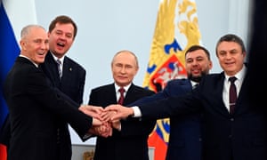 Vladimir Saldo, left, with Vladimir Putin and other officials