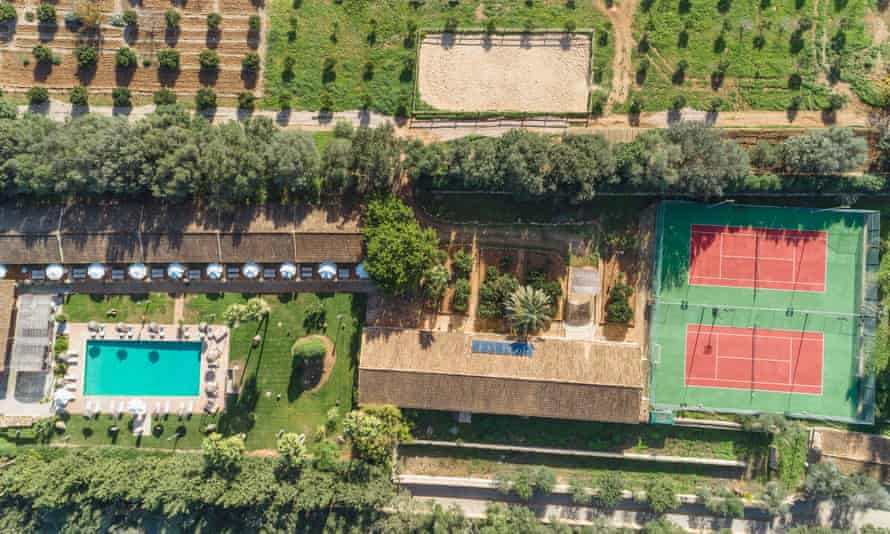 ‘The glorious pool is flanked by palm trees’: Sa Bassa Rotja, Porreres.