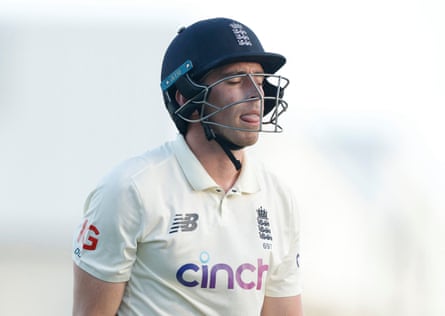 EnglandâÂÂs Dan Lawrence walks after losing his wicket in Barbados in 2022