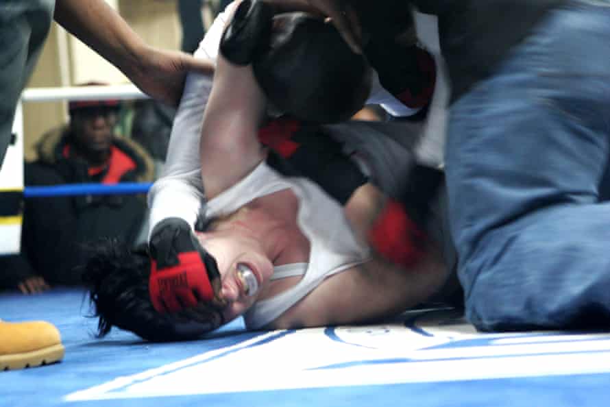 Out for the count: an illegal girl fight in Brownsville, 2006.