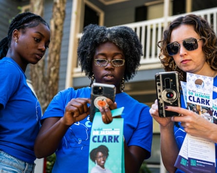 Jasmine Clark (center) with her daughter Jayda Clark, 14, and Georgia state representative Beth Moore in 2022.