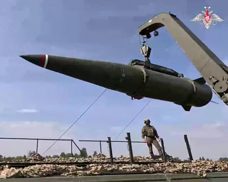 An Iskander missile being loaded on to a mobile launcher.