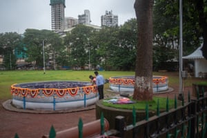 Statues are immersed in artificial ponds at August Kranti Maidan, Mumbai, 23 August.