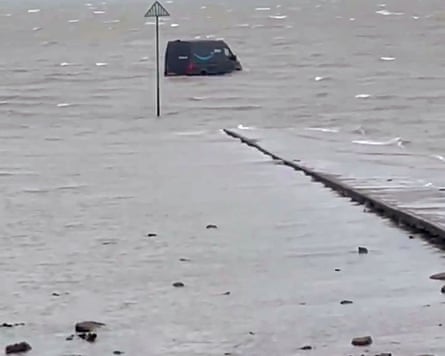 Amazon van half-submerged in water