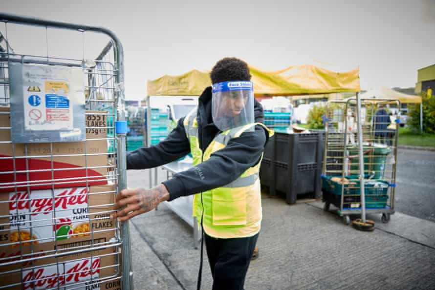 Marcus Rashford helping out with food stocks at a FareShare centre.