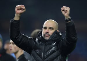 Guardiola celebrates his teams 4-1 win.