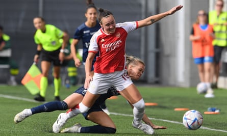 Caitlin Foord is challenged during Arsenal’s defeat by Paris FC