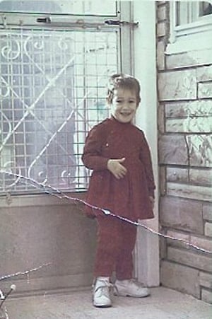 Ona, aged three, with the leg brace she had to wear.