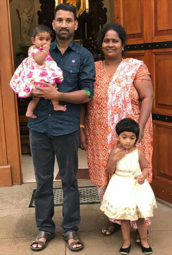 Nadesalingam and Priya and their Australian-born daughters, Tharunicaa and Kopiga