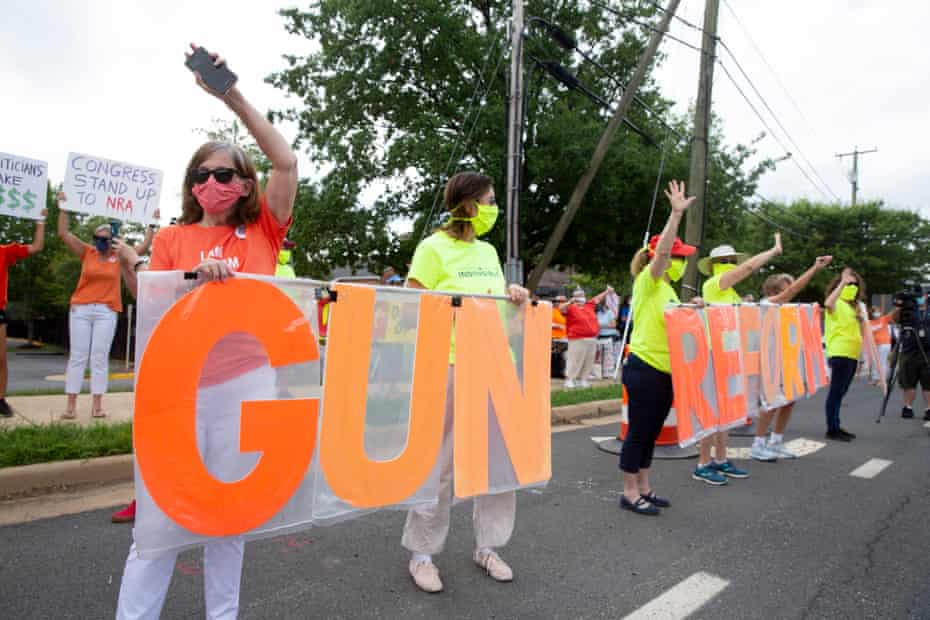 Gun control reform advocates protest outside the National Rifle Association headquarters in Fairfax, Virginia, on 14 August.