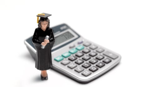 Female student cake topper stands in front of a calculator with 7% reading on the screen.