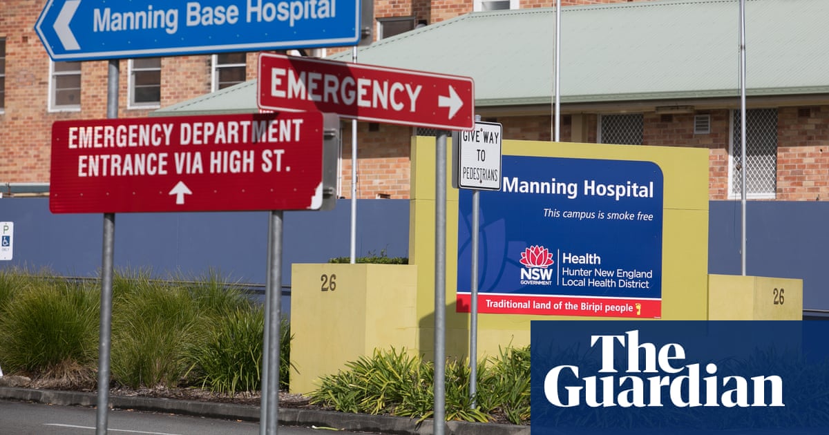 Man shot dead by police in NSW hospital car park after allegedly aiming gun at officers