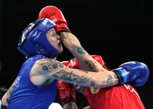 Northern Ireland’s Carly McNaul takes on Australia’s Kristy Lee Harris in the boxing.