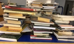 Photo issued by the CPS of books recovered from Elizabeth McGregor’s home