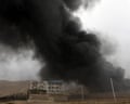 Smoke rises from the Shahran oil depot in Tehran