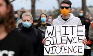 People participate in a Black Lives Matter demonstration at Langley Park in Perth, Australia, 13 June 2020.