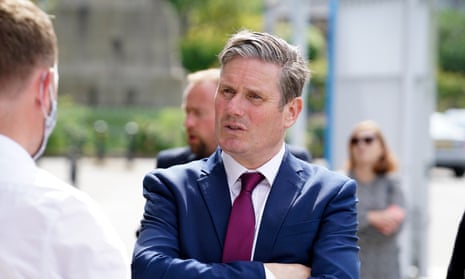 Keir Starmer speaking to a member of the public.