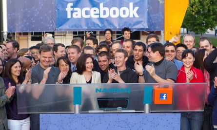 Sheryl Sandberg and Mark Zuckerberg celebrate after ringing the Nasdaq opening bell before Facebook’s IPO in 2012.
