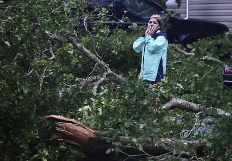 Zuram Rodriguez surveys the damage around her mobile home in Davie, close to Fort Lauderdale, Florida, on Wednesday morning.