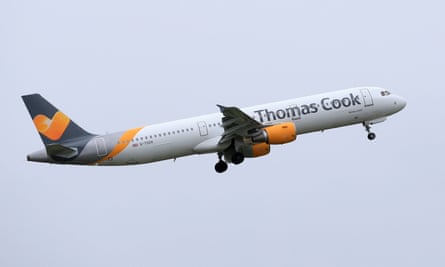 A Thomas Cook plane in flight.