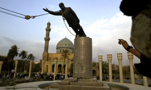 A statue of Saddam Hussein being pulled down in Baghdad’s Firdos Square in April 2003. 