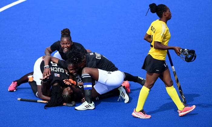 Flavia Mutiva of Kenya celebrates with teammates after scoring a late equaliser against Ghana.