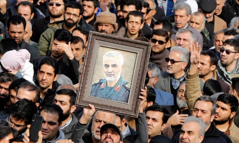 Iranians take to the streets in Tehran to mourn the death of Suleimani